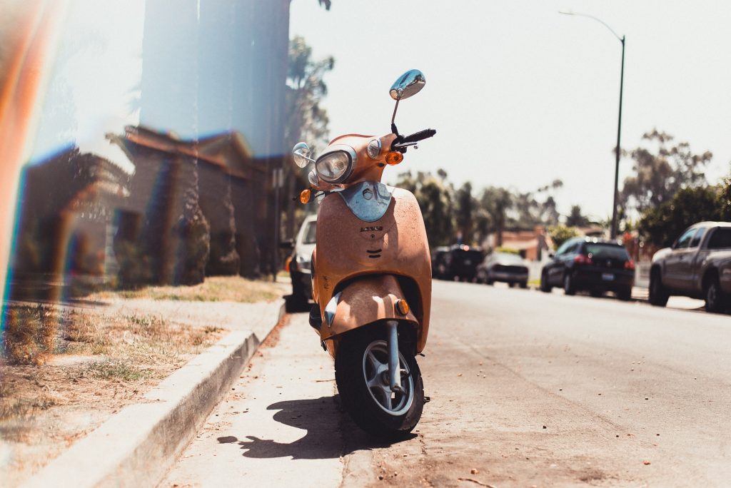 Photo by Spencer Selover: https://www.pexels.com/photo/parked-orange-motor-scooter-on-road-near-parked-vehicle-567443/

Conclusion